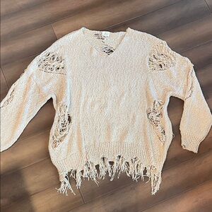 Elegant Cream V-Neck Distressed Sweater